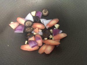 Heat a little oil, bloom the garlic, then add