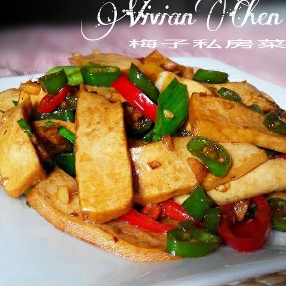 Smoked xianggan with black beans, chili, and garlic-scape
