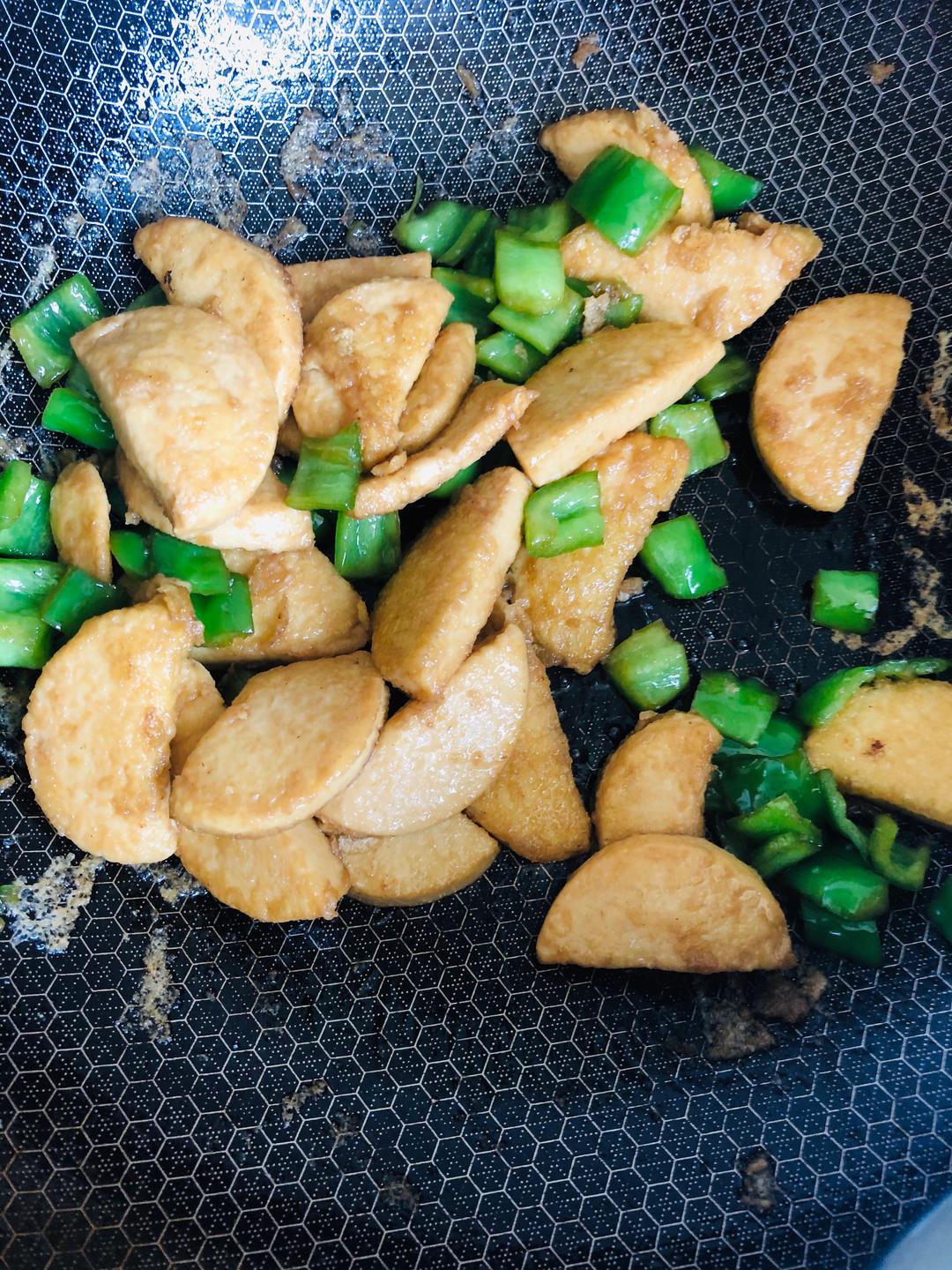 Add light soy and salt and toss
